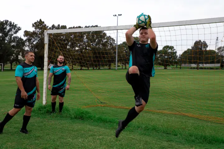 soccer players playing in matching custom shorts